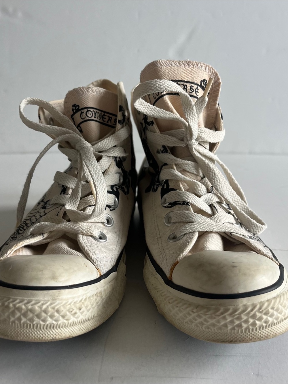 Converse Cream High-Top Canvas Sneakers with Black Print